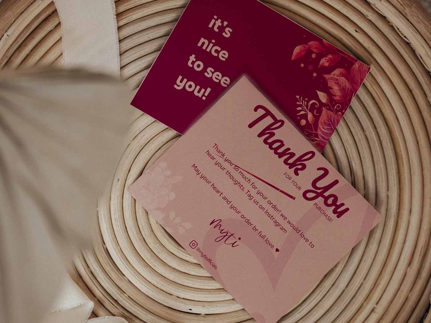Myti thank-you card and envelope in a basket